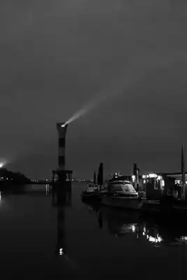 A black and white picture of a lighthouse in Hamburg, Germany.