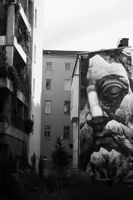 A black and white picture of a graffiti.